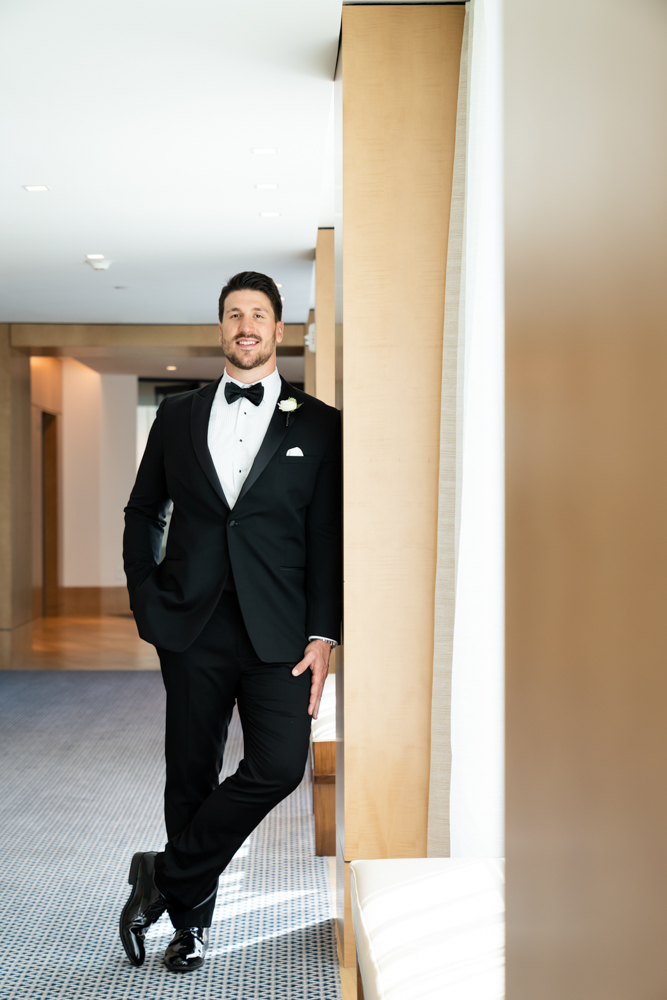 Black and white groom portrait at The Crescent Hotel, Fort Worth