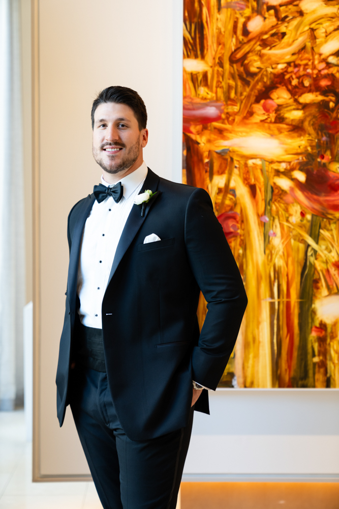 Black and white groom portrait at The Crescent Hotel, Fort Worth