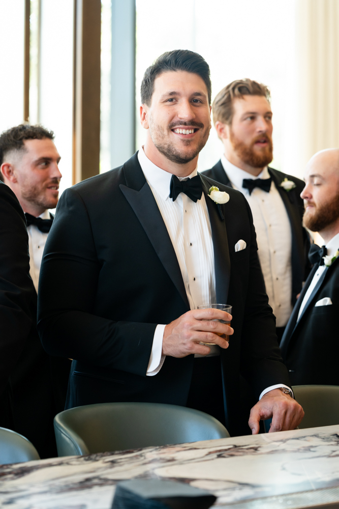 Groom and groomsmen in tuxes, Fort Worth wedding at The Crescent