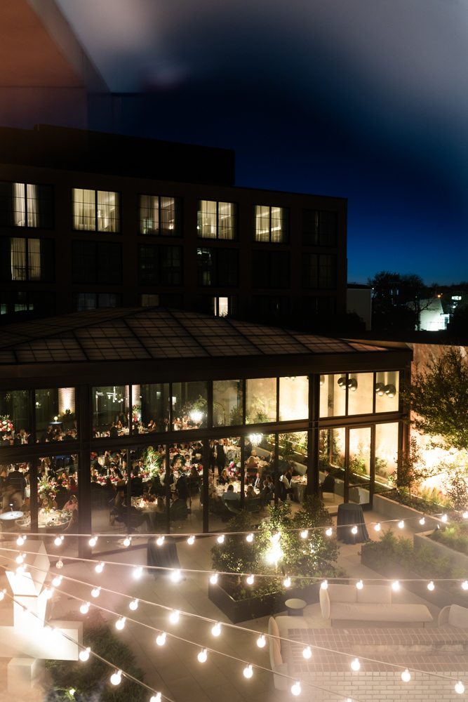 Chandeliers and florals in the Crescent Hotel atrium, Fort Worth wedding