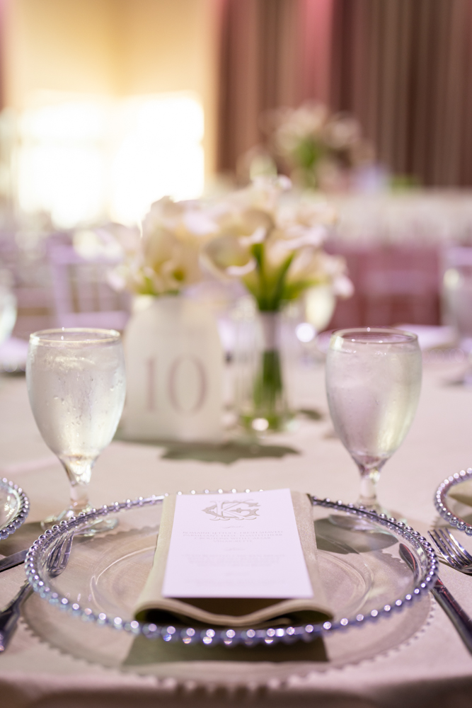 The reception at McDavid Studio in white, green, and pink