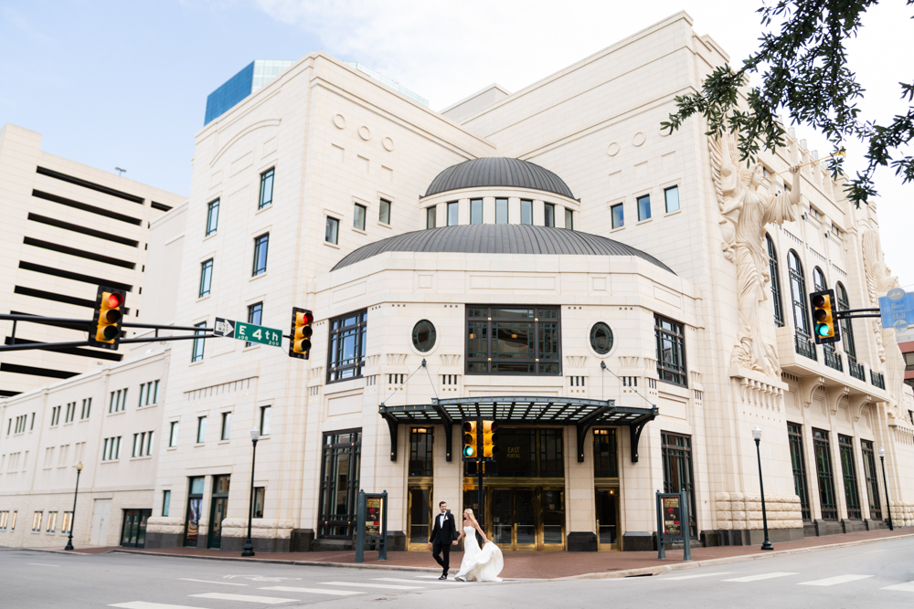 Wedding party portraits in white, green, and pink