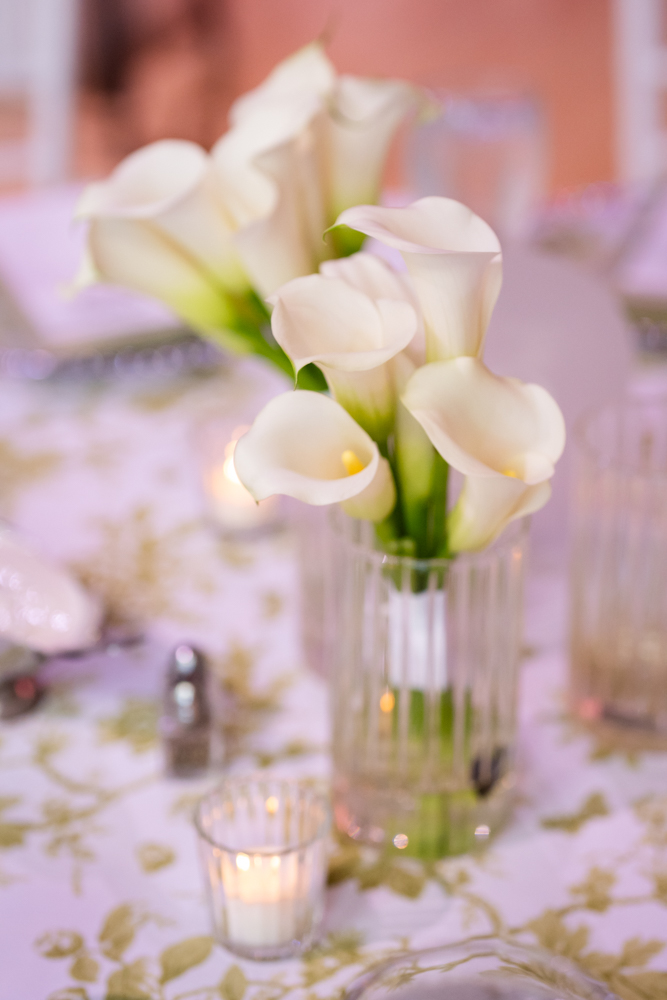 The reception at McDavid Studio in white, green, and pink