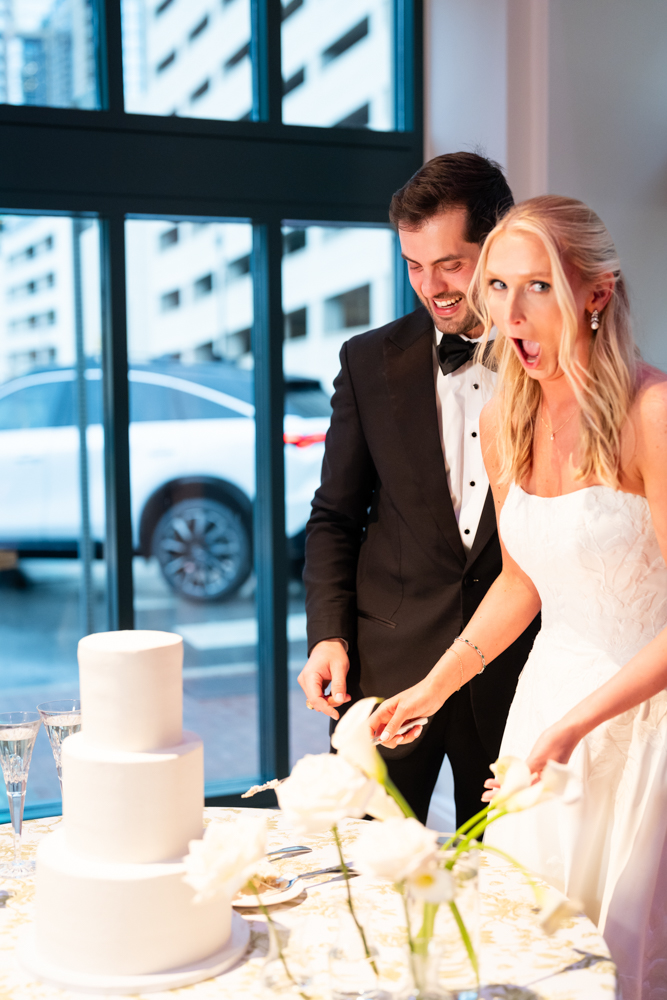 Kathryn and Grant cutting their Sugar Bee Sweets cake