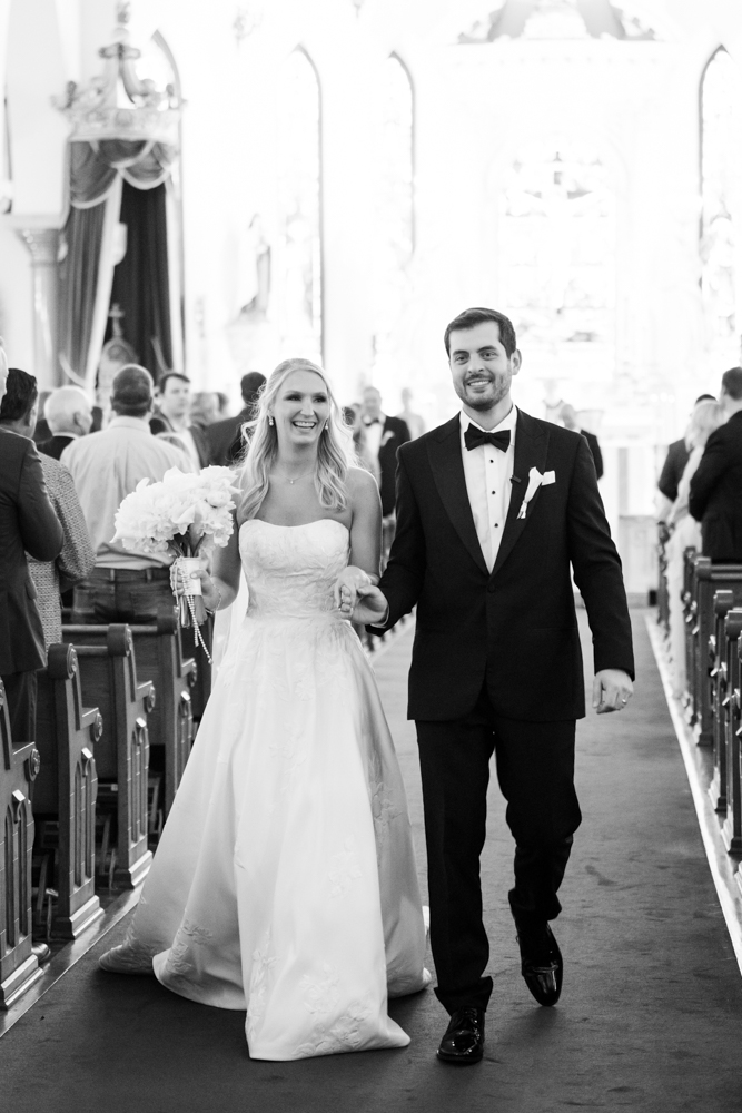 Exchanging vows beneath the stained glass of St. Patrick Cathedral