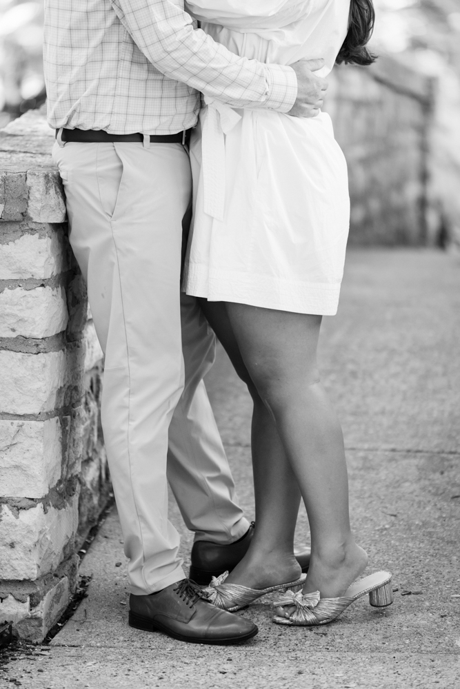 Sarah and Mitchell walking away together at the end of their engagement session