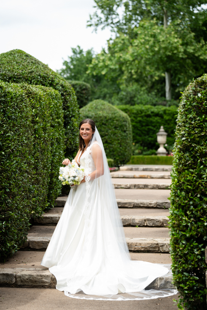 Soft natural light on Hannah's gown in the gardens of the Dallas Arboretum