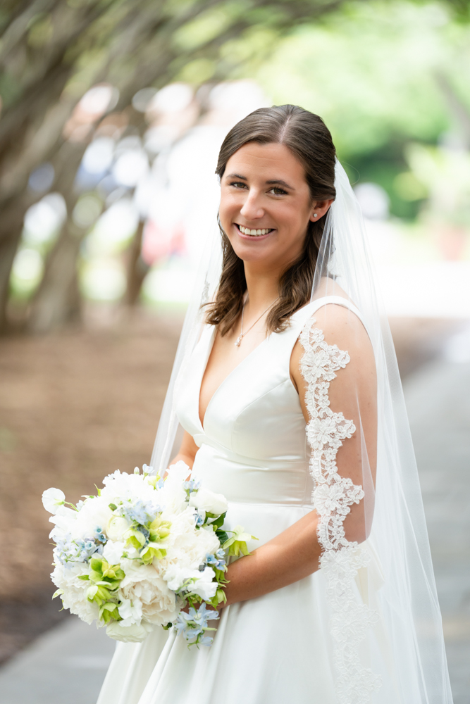 Hannah holding her Three Branches Floral bouquet during her Dallas Arboretum bridal session