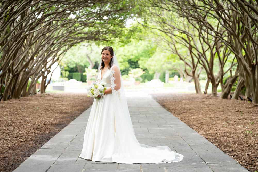 Soft natural light on Hannah's gown in the gardens of the Dallas Arboretum