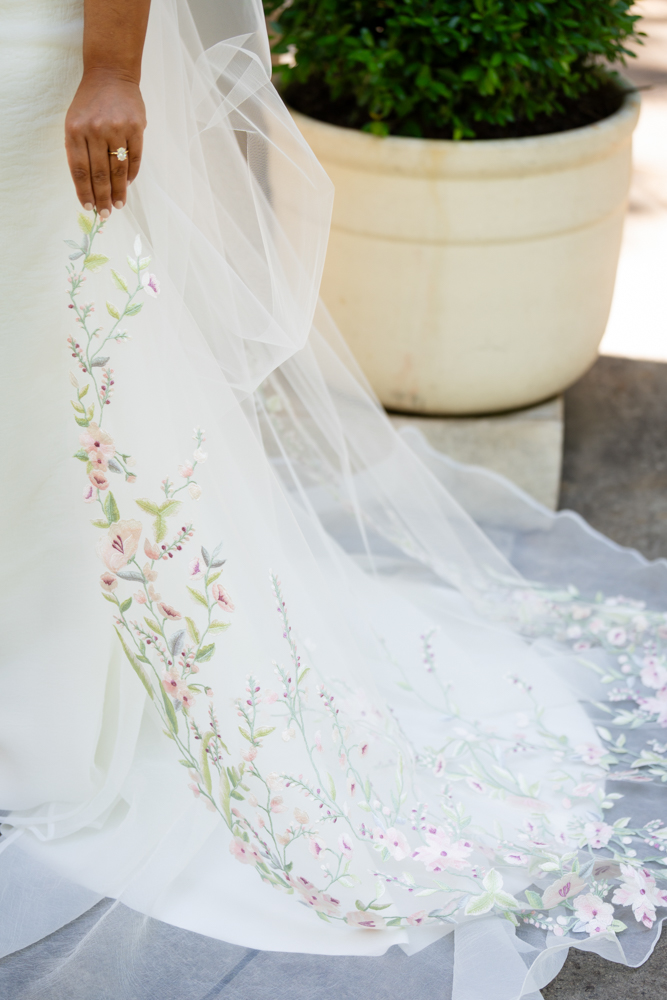 Caroline holding her TWE Floral bouquet at the Fort Worth Botanic Garden