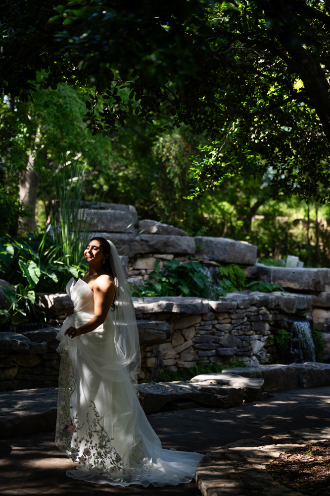 Caroline's gown against the sleek architecture of the Modern in Fort Worth