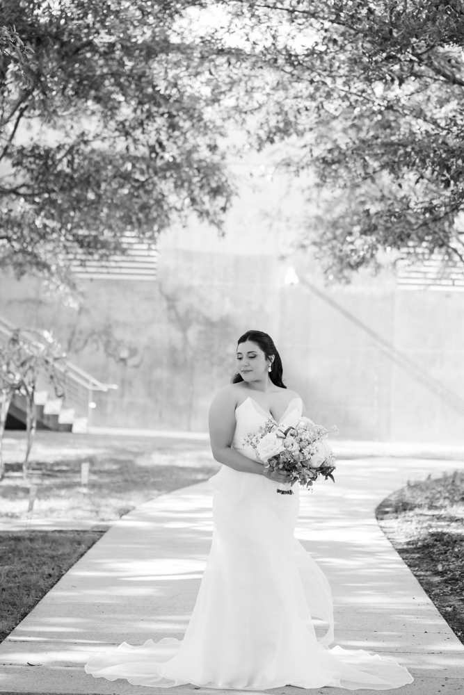 Full-length bridal portrait of Caroline in the gardens in Fort Worth