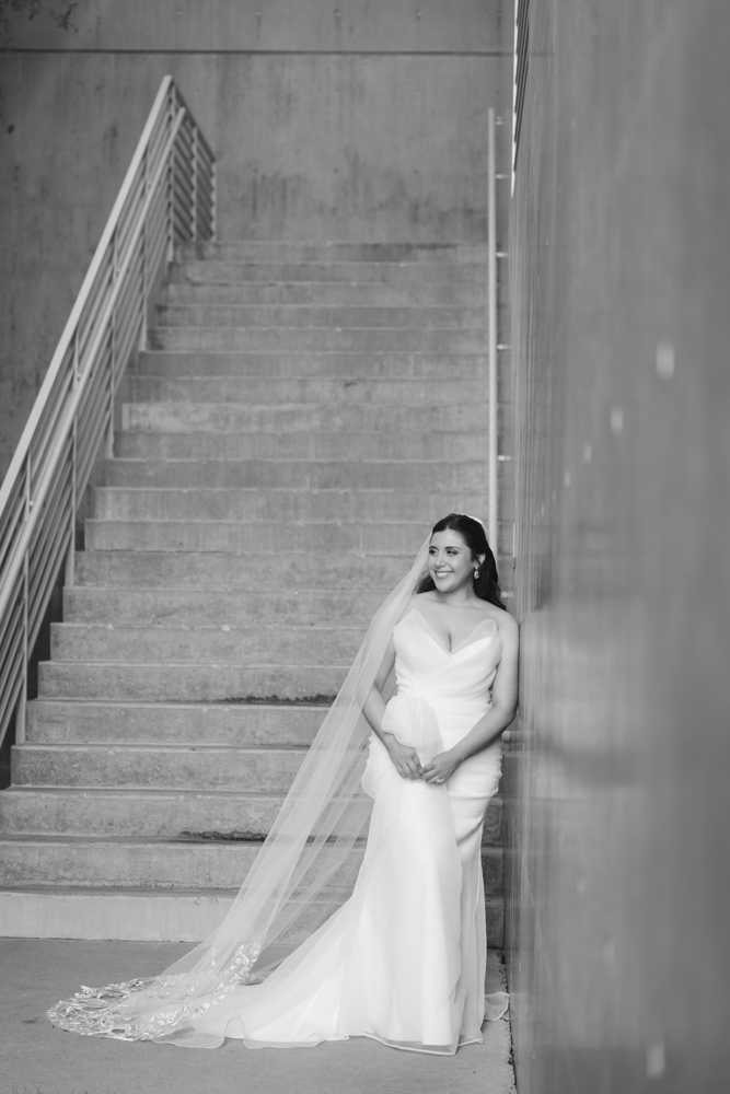Caroline's gown and train among the greenery at the Botanic Garden