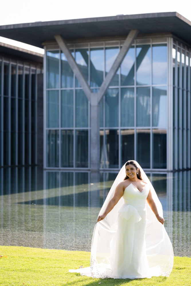 Full-length bridal portrait of Caroline in the gardens in Fort Worth