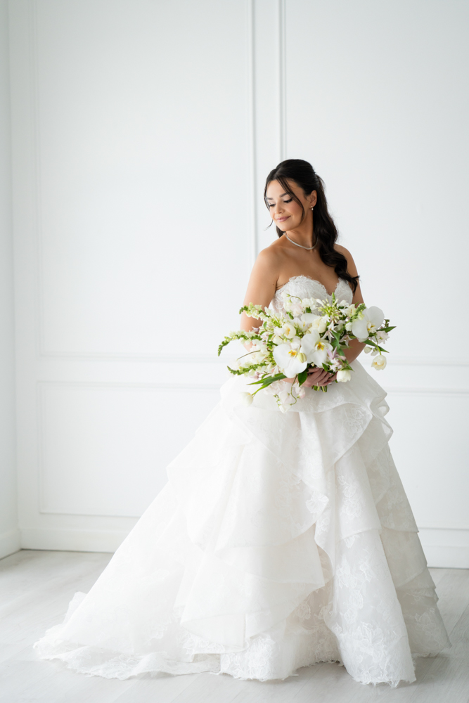 Elegant full-length bridal portrait of Hannah in the studio at The Lumen Room
