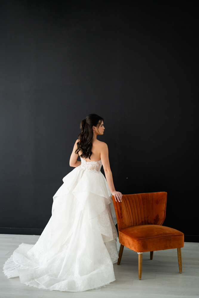 Elegant full-length bridal portrait of Hannah in the studio at The Lumen Room