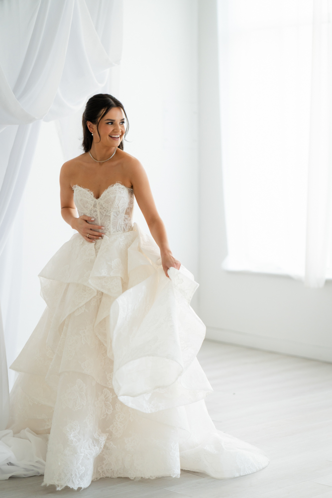 Elegant full-length bridal portrait of Hannah in the studio at The Lumen Room