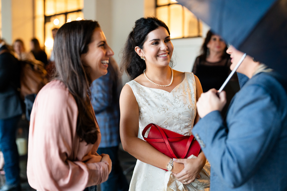 Bailey and Jay's wedding party walking through the ceremony at Il Mercato in New Orleans