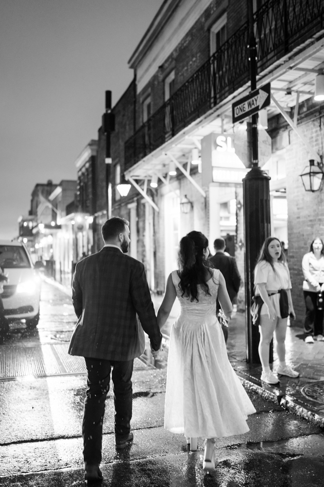 The wedding party figuring out their places during the rehearsal
