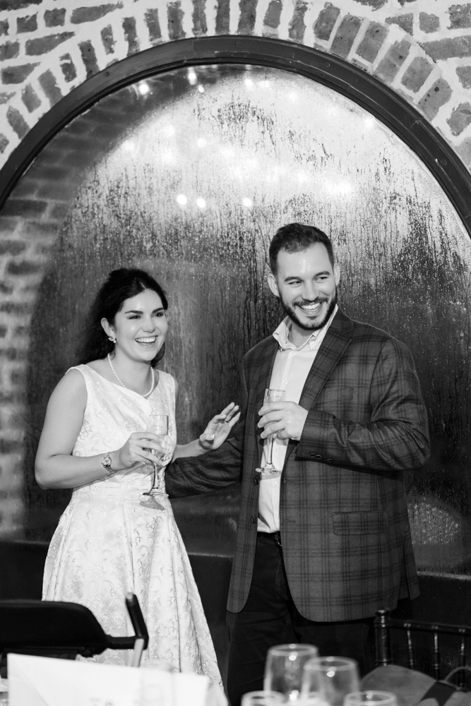 Toasts and laughter at Bailey and Jay's French Quarter rehearsal dinner