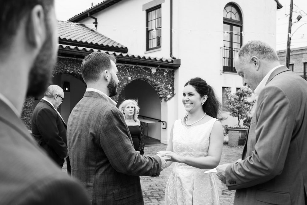 Bailey and Jay surrounded by loved ones the night before their wedding