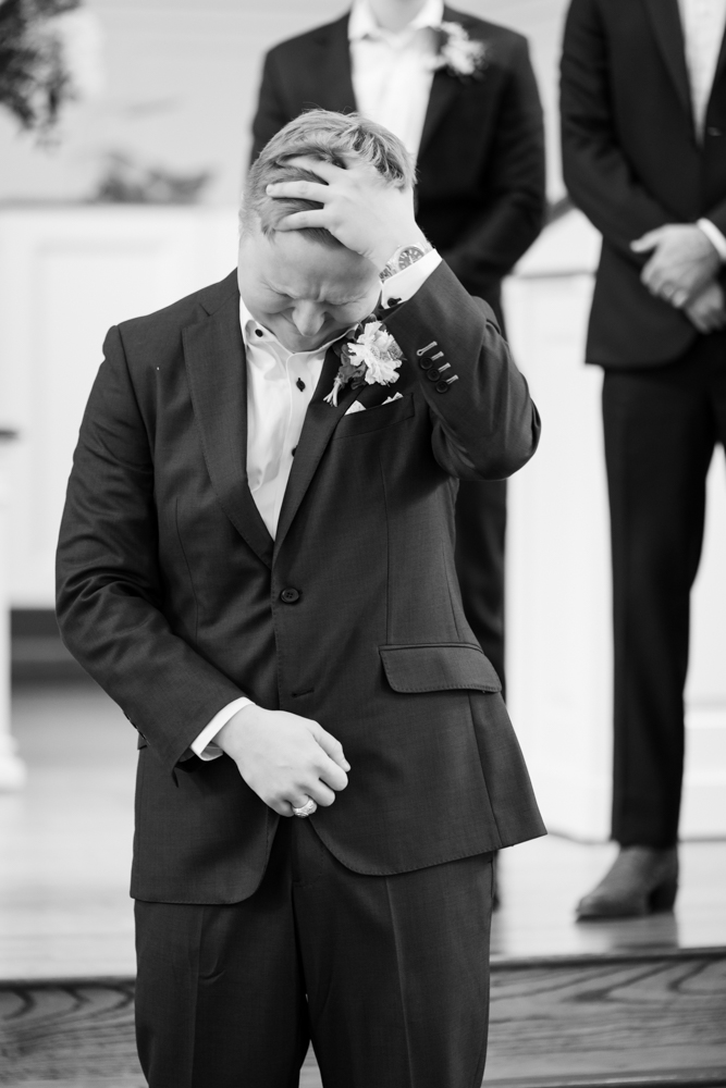 Grooms emotional reaction to bride walking down the aisle at Robert Carr Chapel