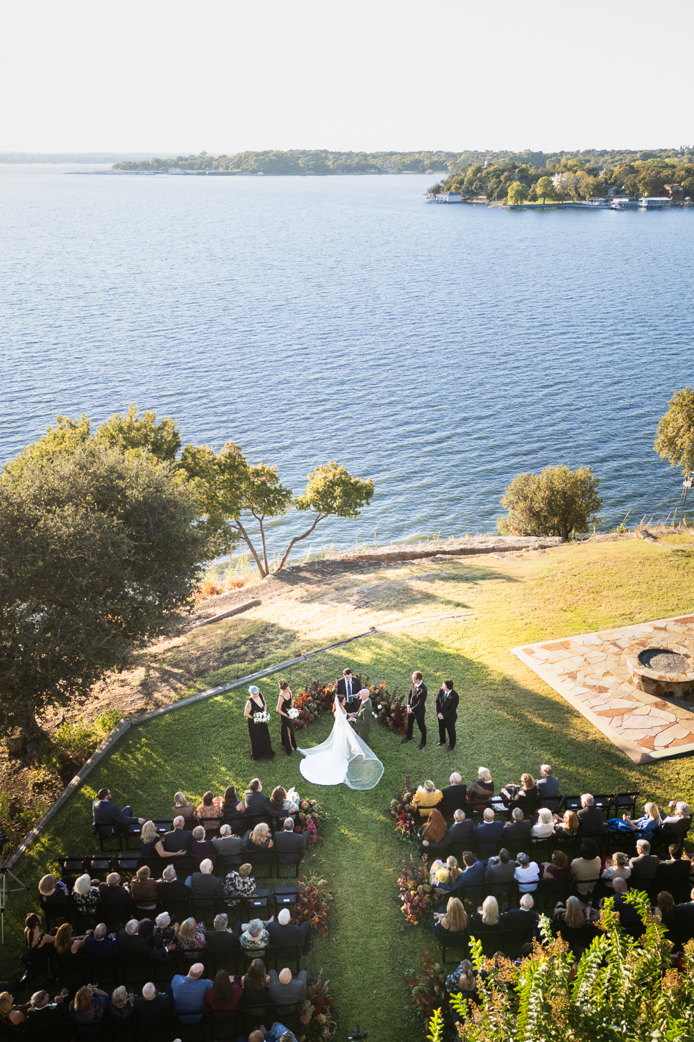 aerial drone wedding ceremony photo at private lake residence in fort worth, texas