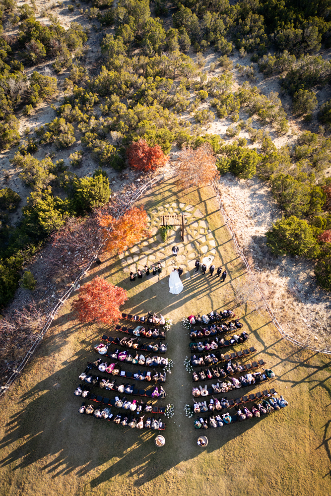 drone photo of wedding ceremony at dove ridge vineyard in the fall by tracy autem photography