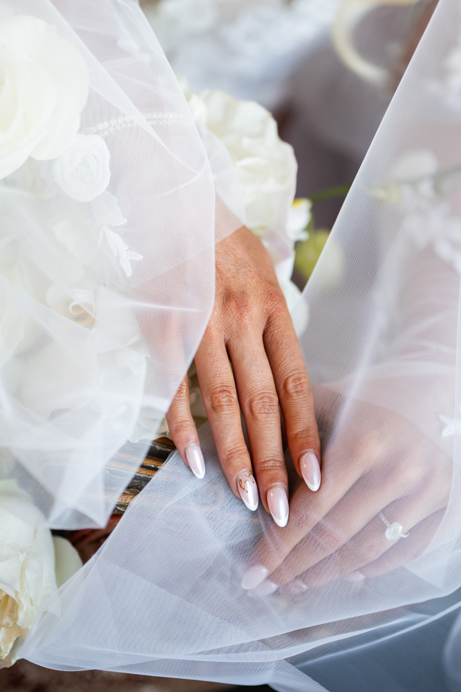 Libby's lace sleeve and manicure with orchids, The Fort Worth Club