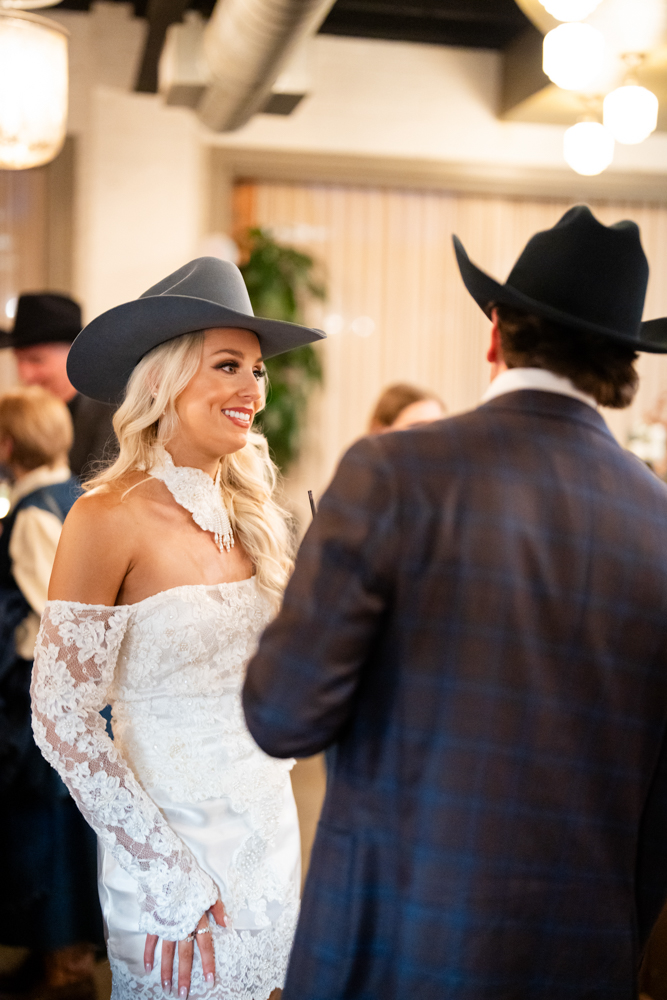Guests laughing at the Clay Pigeon rehearsal dinner, Fort Worth