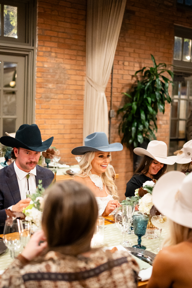 Warm candid from Libby & Jonathan's Clay Pigeon rehearsal dinner